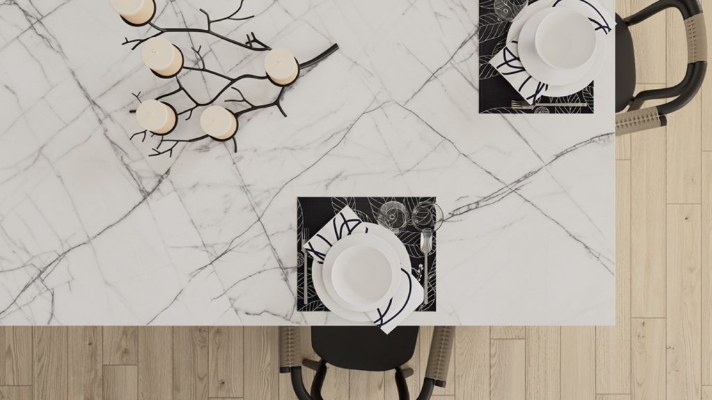 Marble effect worktop with black and white place settings